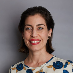 Anita Dessaix. Woman smiling.