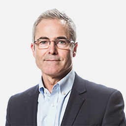 Associate Professor David Francis. Man wearing glasses.