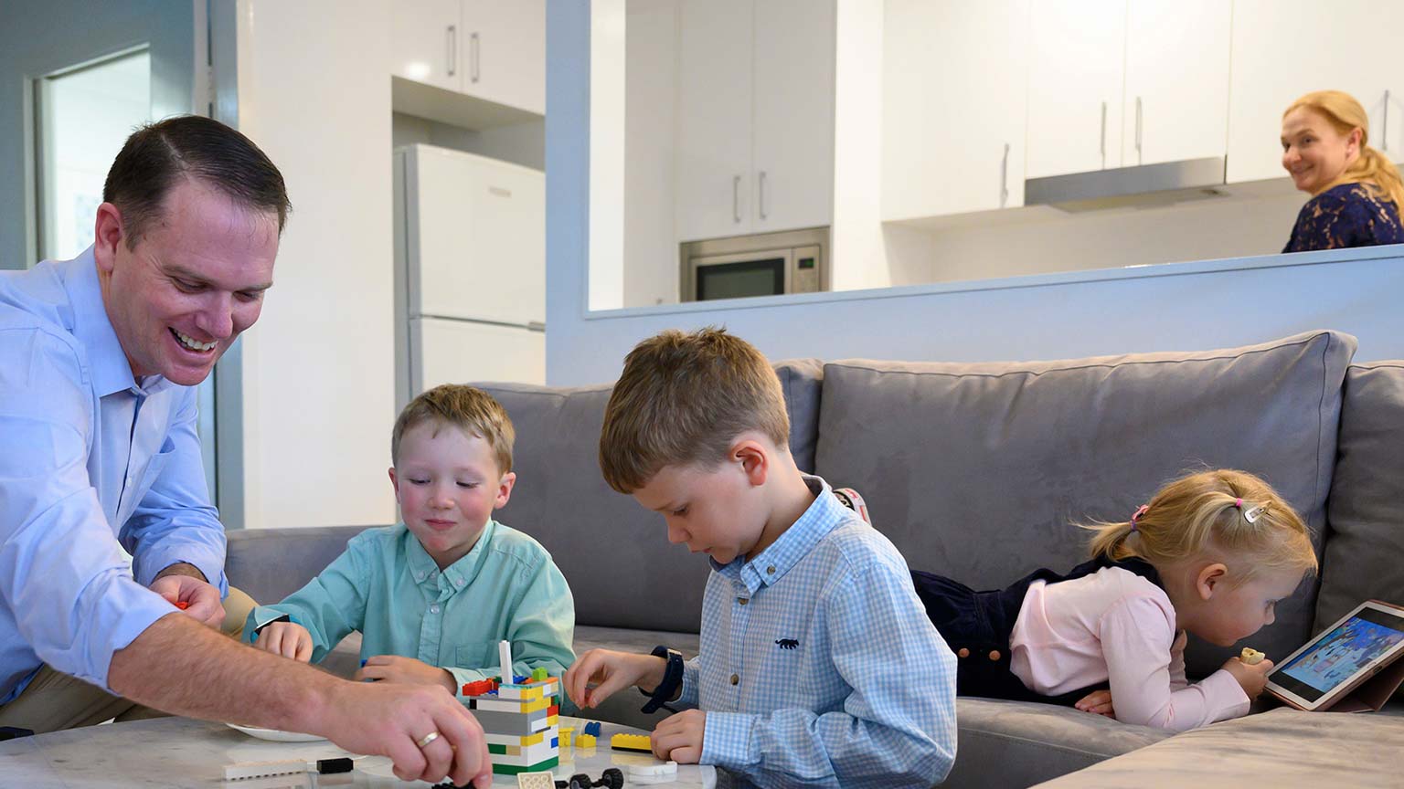 Kurt Rose playing with his family